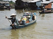 Villager on Tonle Sap River, Cambodia.